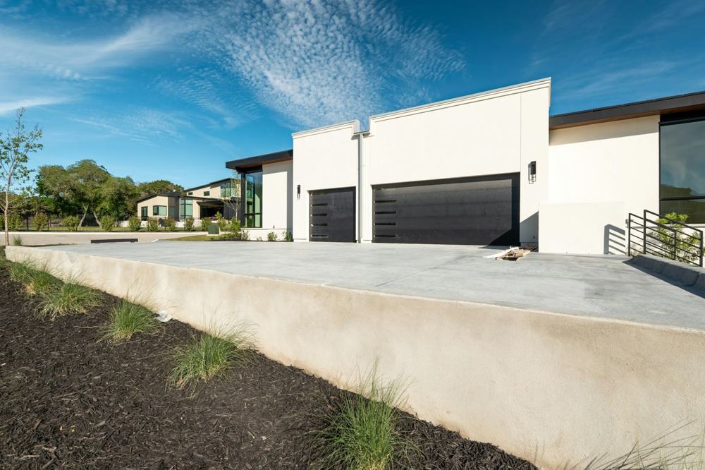 Modern home with a new concrete driveway
